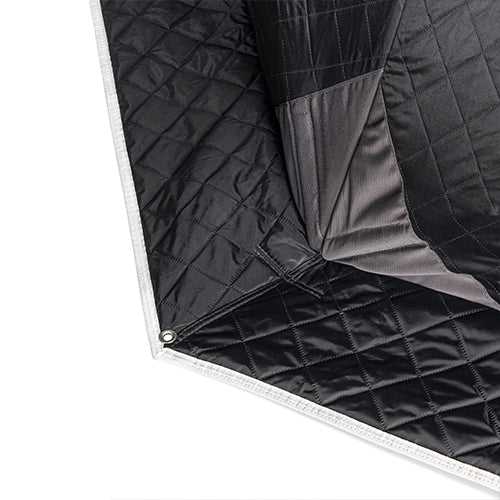 Close-up of SaunaLife SaunaTrekker XL quilted insulated sauna tent wall and reinforced anchor skirt