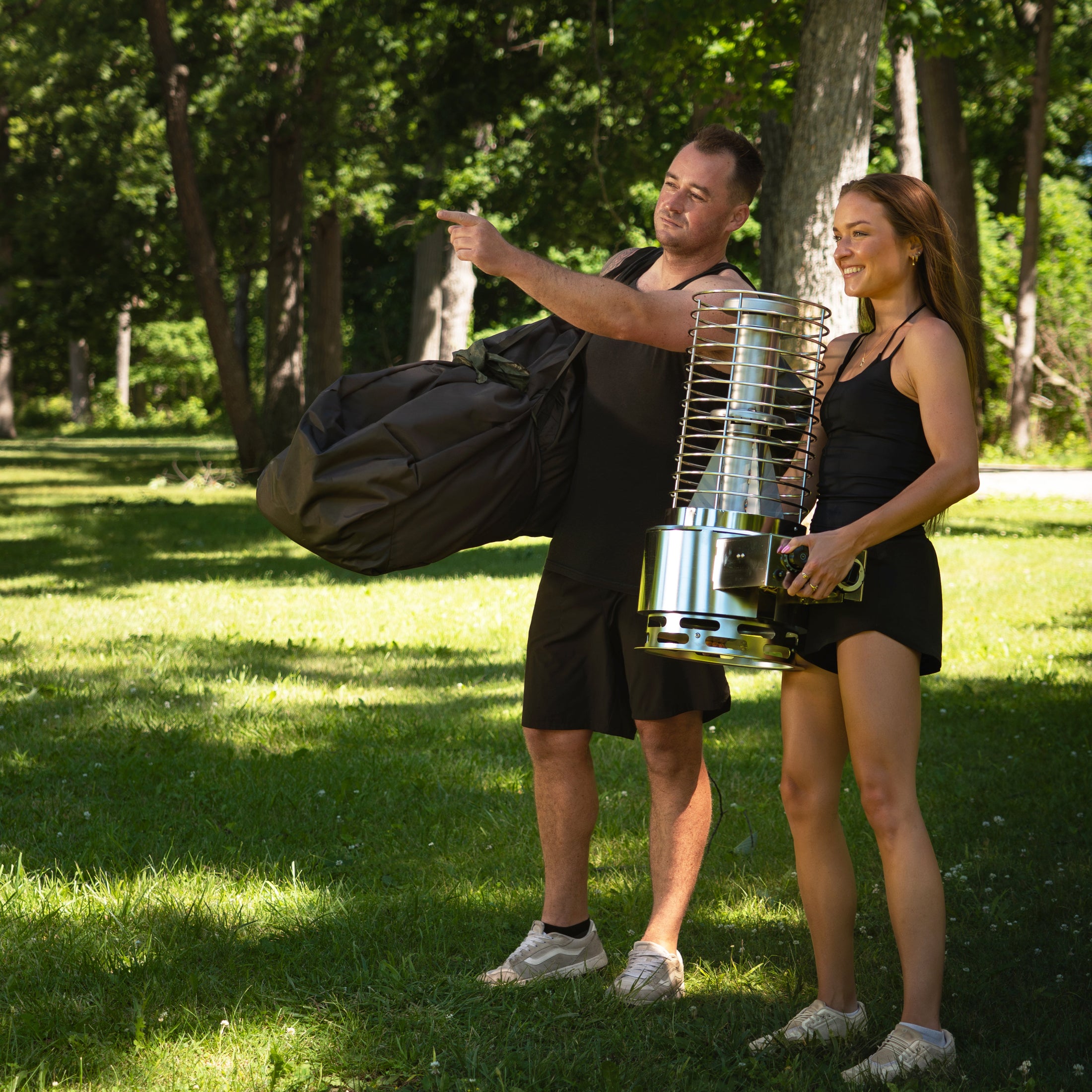 SaunaLife SaunaTrekker XL portable sauna setup with heater and carrying bag for outdoor use