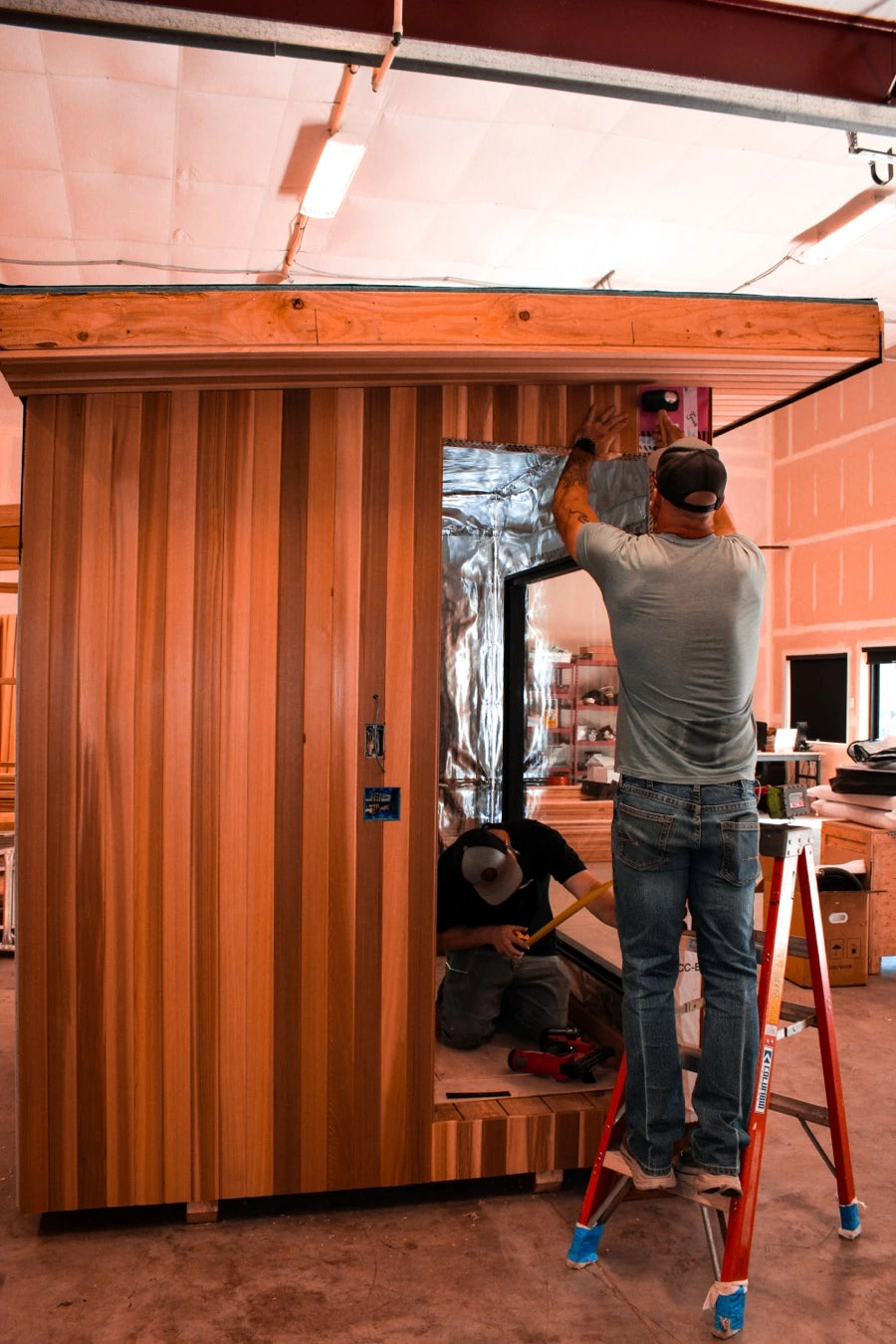 Eric working on a sauna build in the workshop